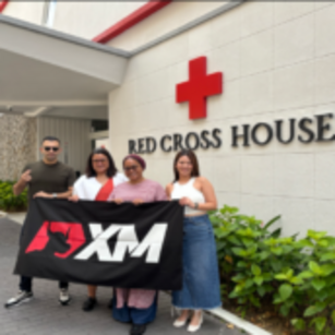 XM en Rode Kruis van Singapore staan samen sterk